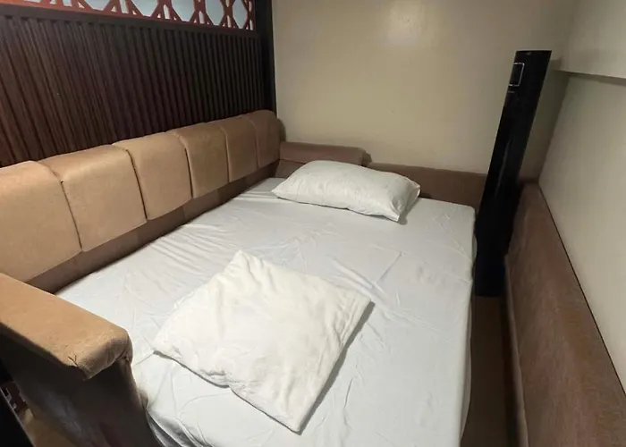 アパートホテル Comin'joy Condotel At One Palm Tree 2*
